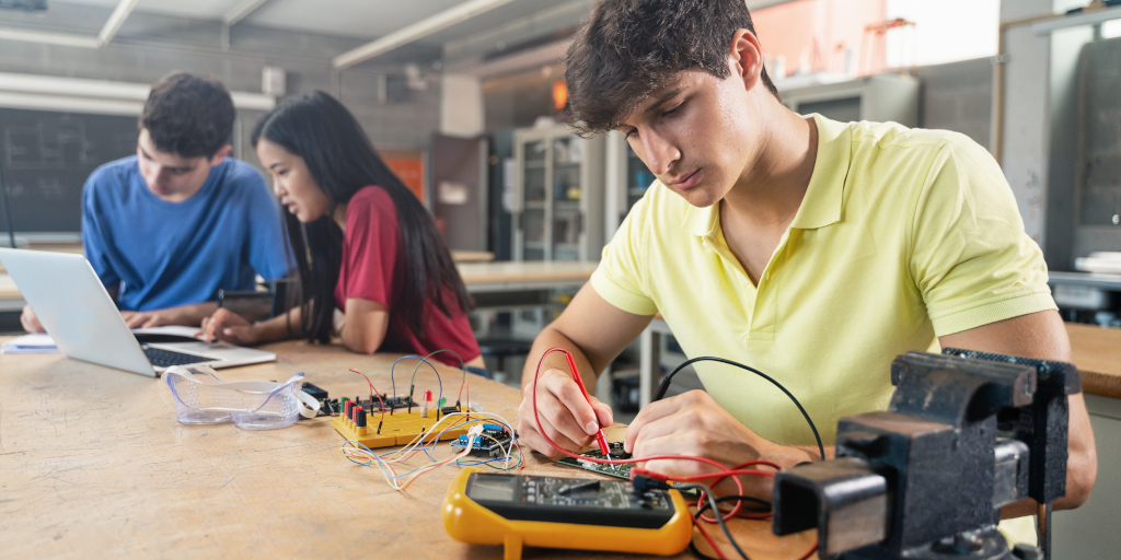 college-student-working-on-electronics-circuit-in-2022-10-04-23-10-23-utc-1